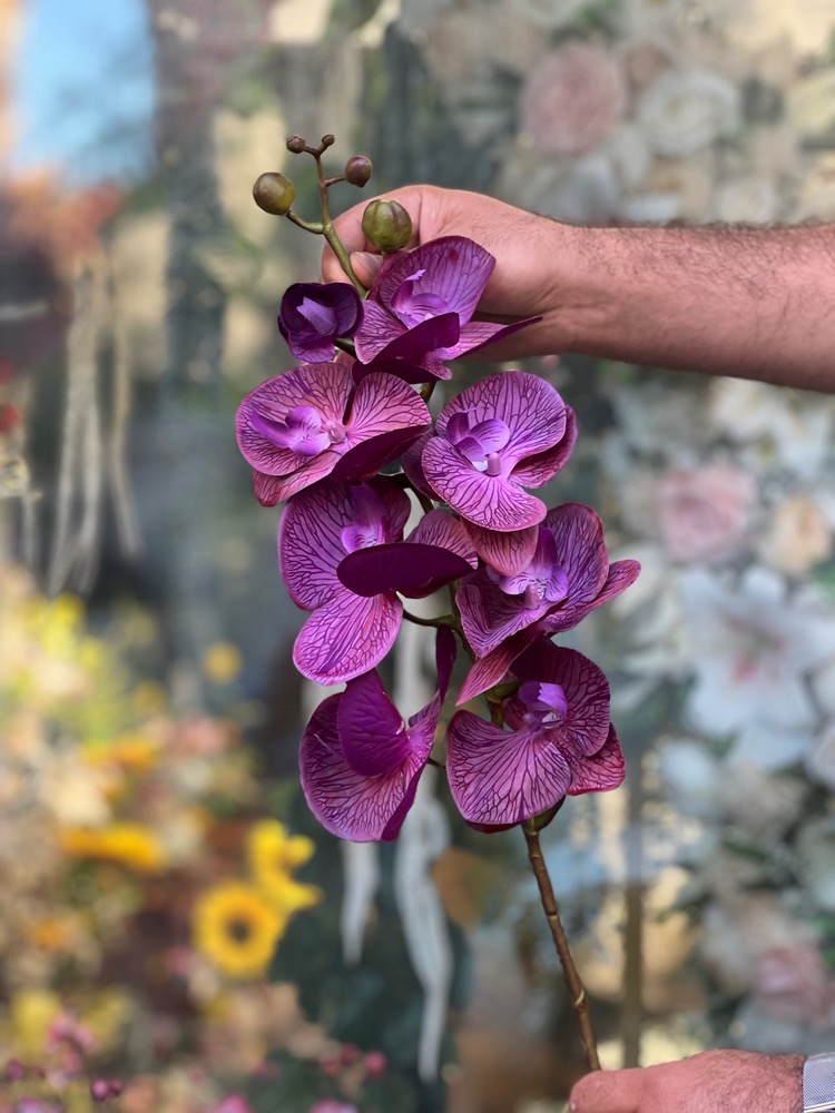 گل مصنوعی ارکیده بنفش چرمی وارداتی ۷گل